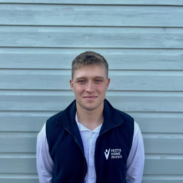 Jacob in his Vectis Home Physio uniform.